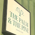 The Palm & The Pine sign